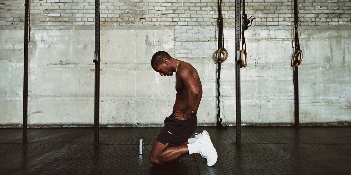 Athlete kneeling with RAW and Cadence can in front of them